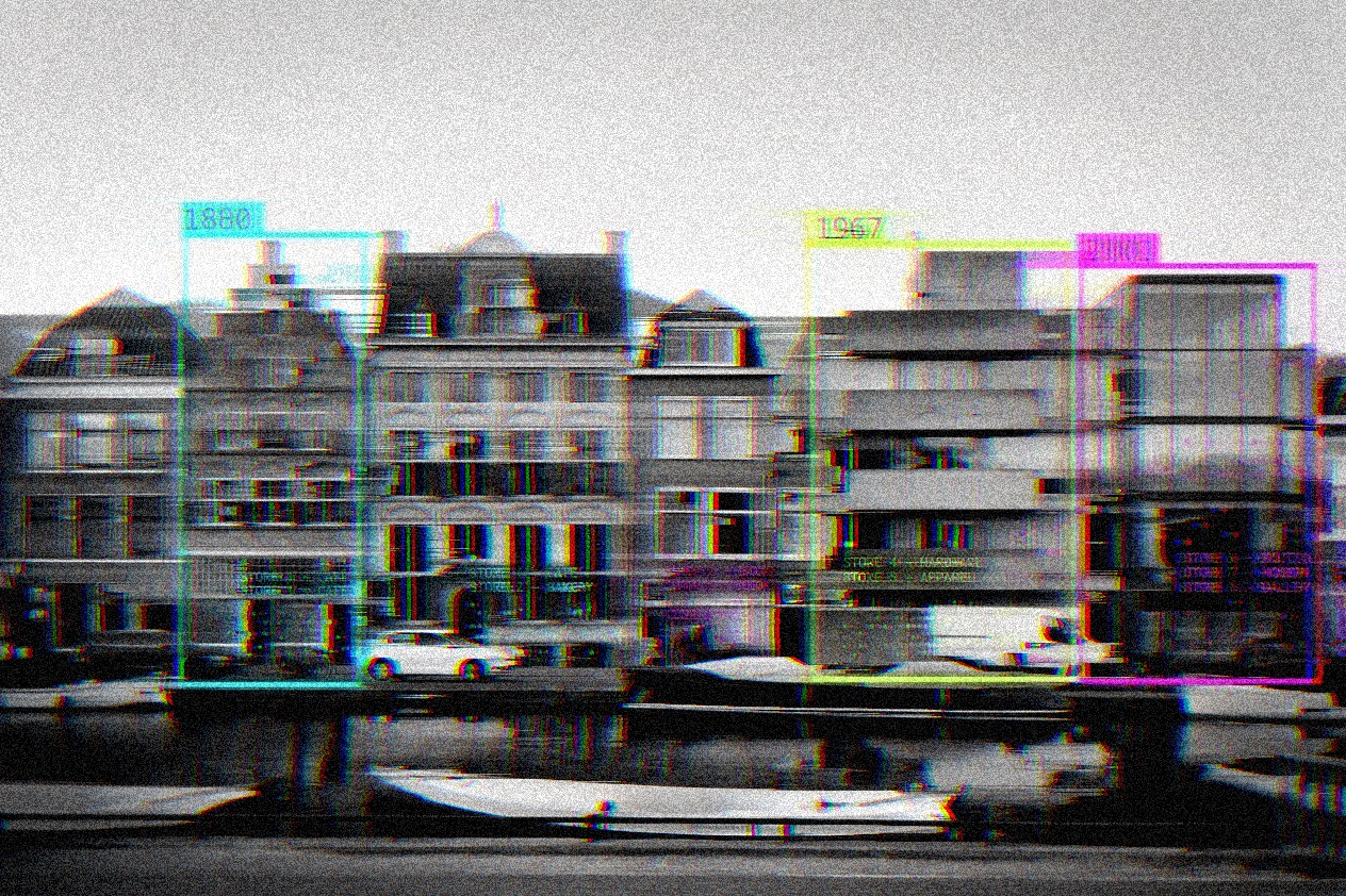 A Dutch canal frontage where old and new buildings stand side by side, some marked with their construction years